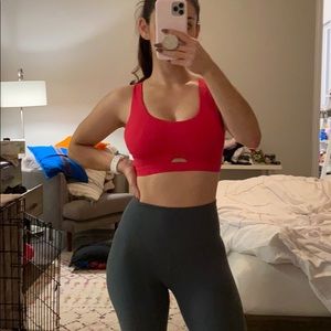 Hot pink Fabletics sports bra.